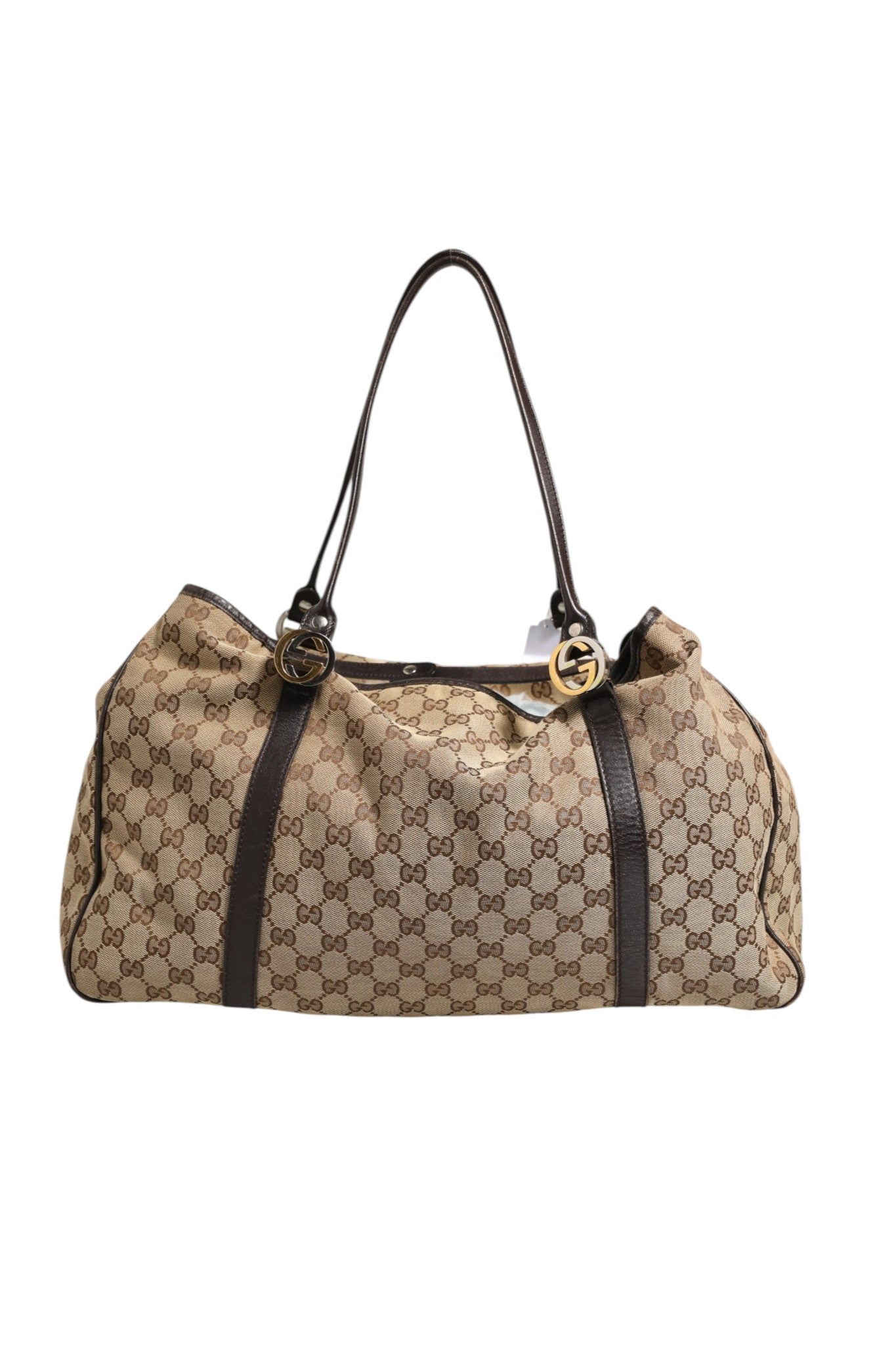 Elevate your style with the Gucci Beige and Black Canvas Twins Medium Tote Bag, a masterpiece of canvas and leather that embodies timeless elegance and sophistication.