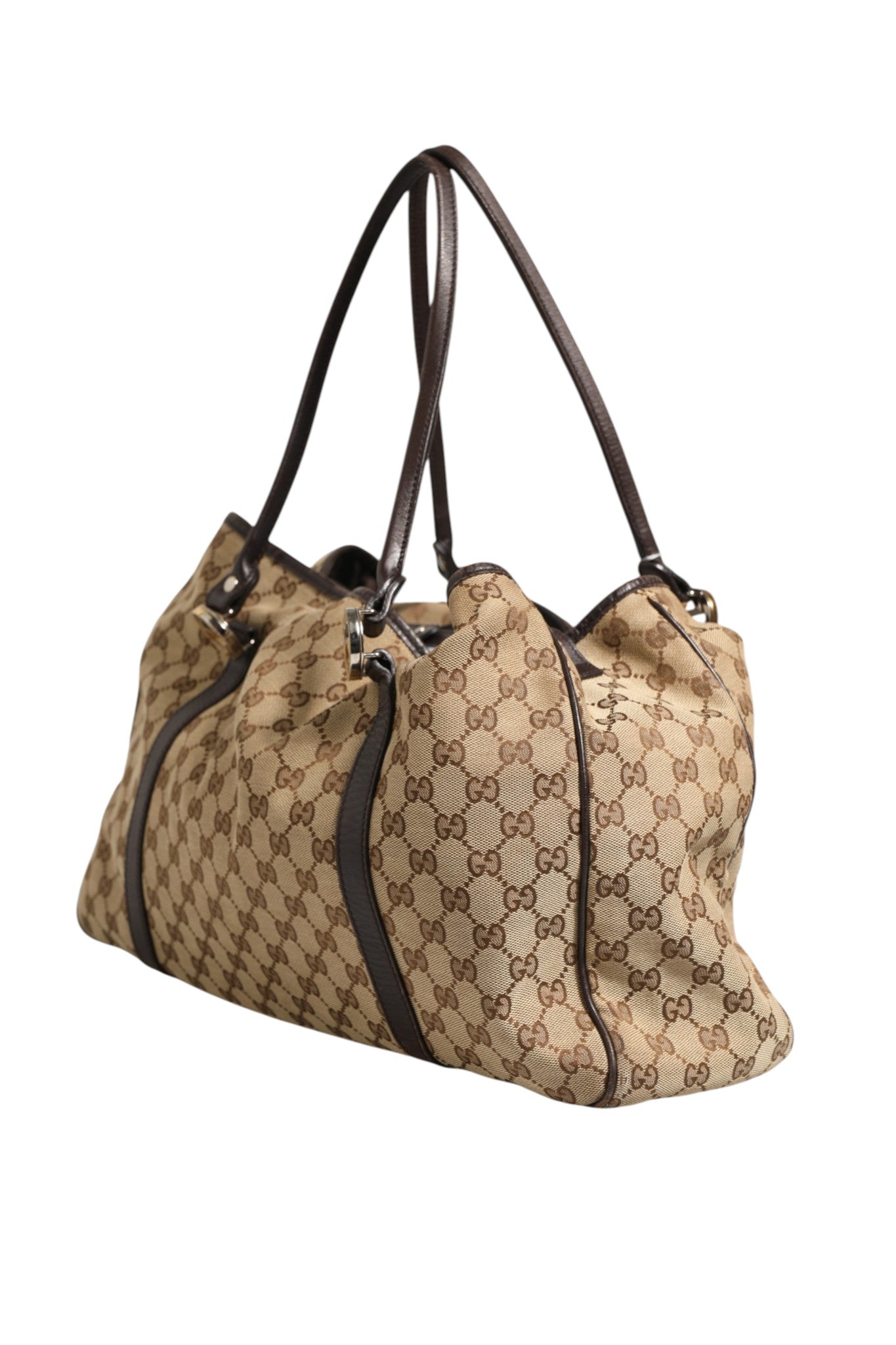 Elevate your style with the Gucci Beige and Black Canvas Twins Medium Tote Bag, a masterpiece of canvas and leather that embodies timeless elegance and sophisticated allure.