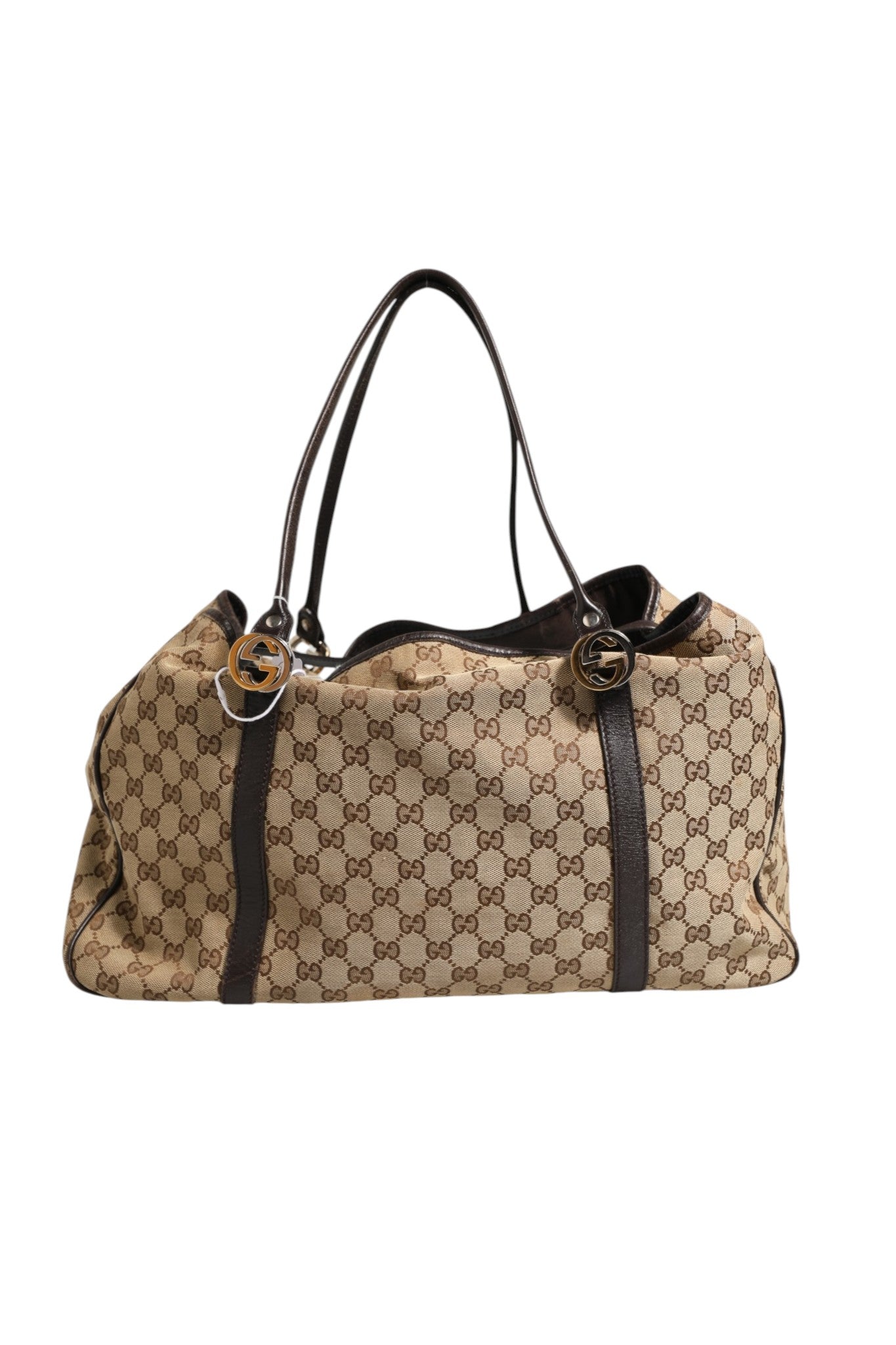 Elevate your style with the Gucci Beige and Black Canvas Twins Medium Tote Bag, a masterpiece of craftsmanship in premium materials, perfect for the discerning individual.