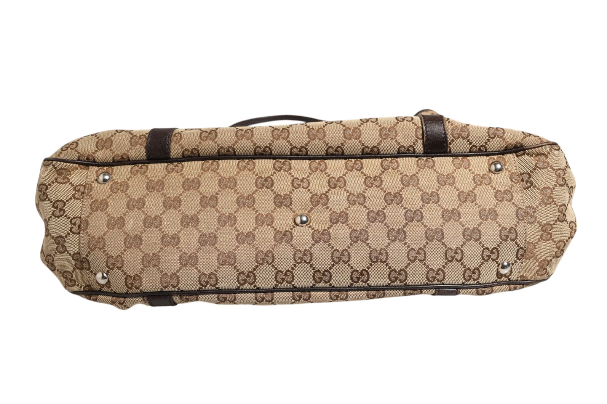 Experience the allure of the Gucci Beige and Black Canvas Twins Medium Tote Bag, where exquisite craftsmanship meets timeless elegance, perfect for every sophisticated occasion.