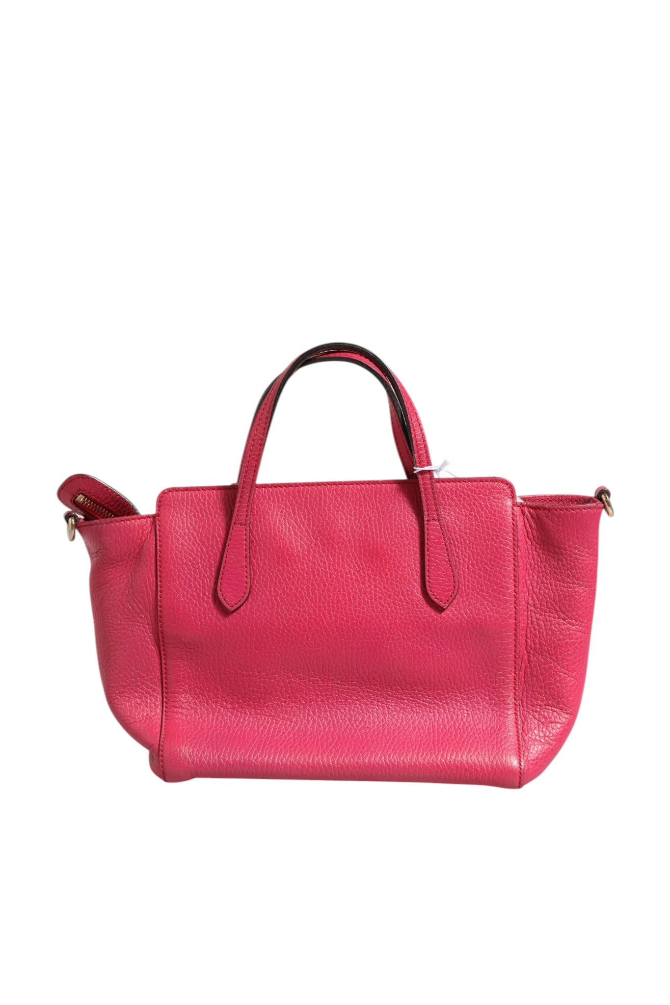 Elevate your style with the Gucci Swing Leather 2Way Tote Bag, a fuchsia pink masterpiece that embodies luxury and versatility for the discerning individual.