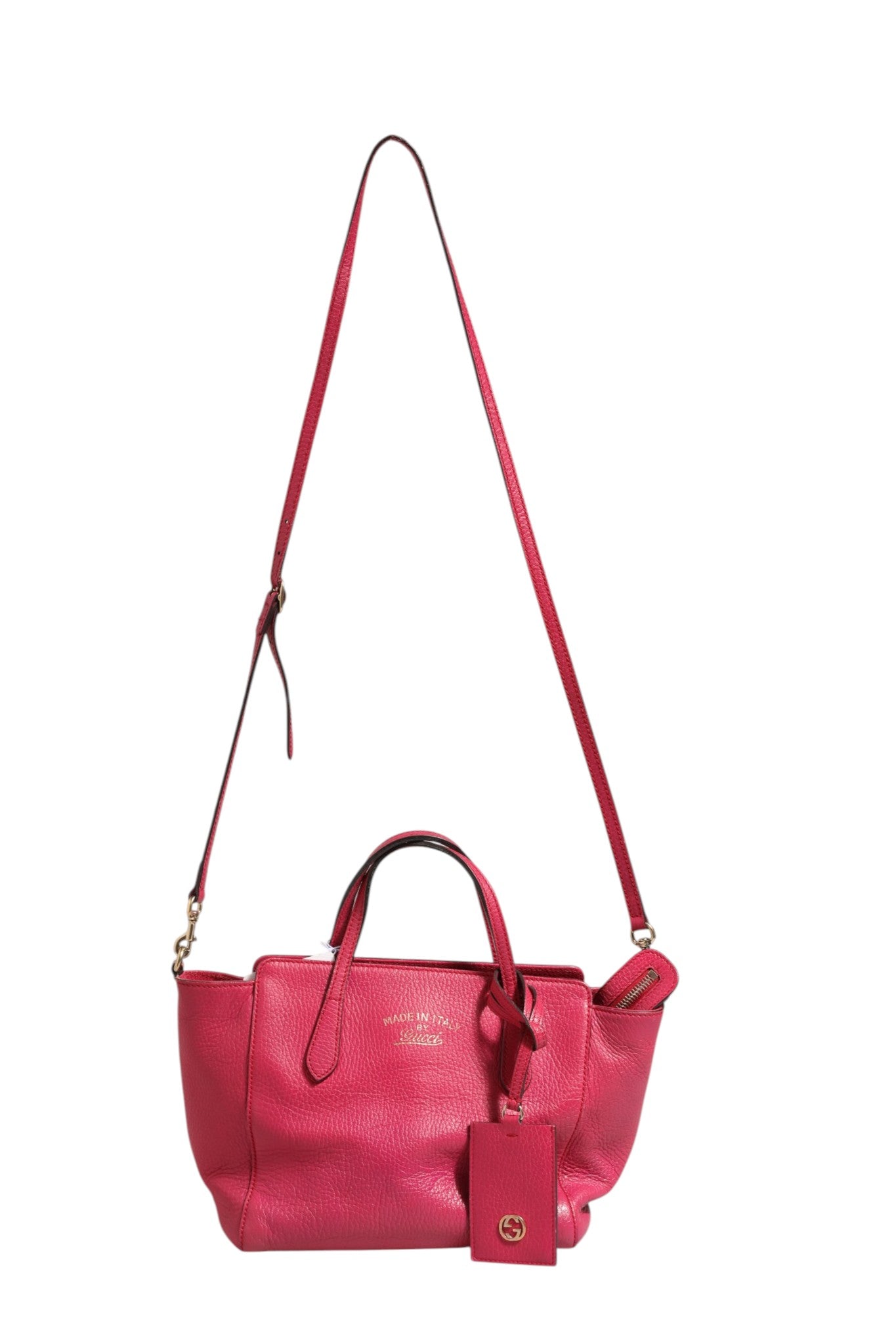 Elevate your style with the Gucci Swing Leather 2Way Tote Bag, a luxurious fuchsia pink masterpiece that embodies sophistication and versatility for the discerning fashion lover.