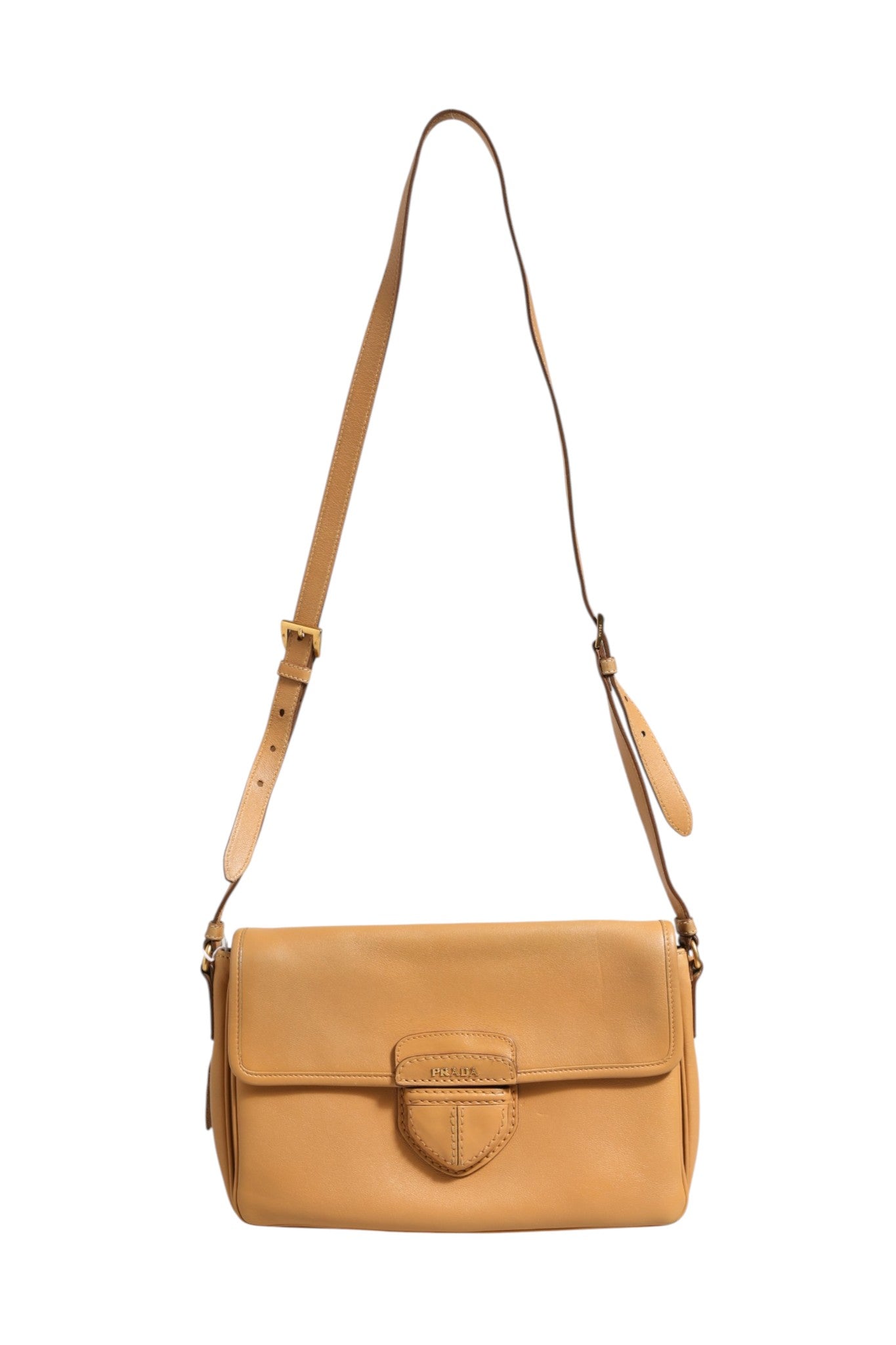 Elevate your style with the Prada Sidonie Beige Pebble Leather Shoulder Bag, a masterpiece of craftsmanship that embodies sophistication and timeless elegance.
