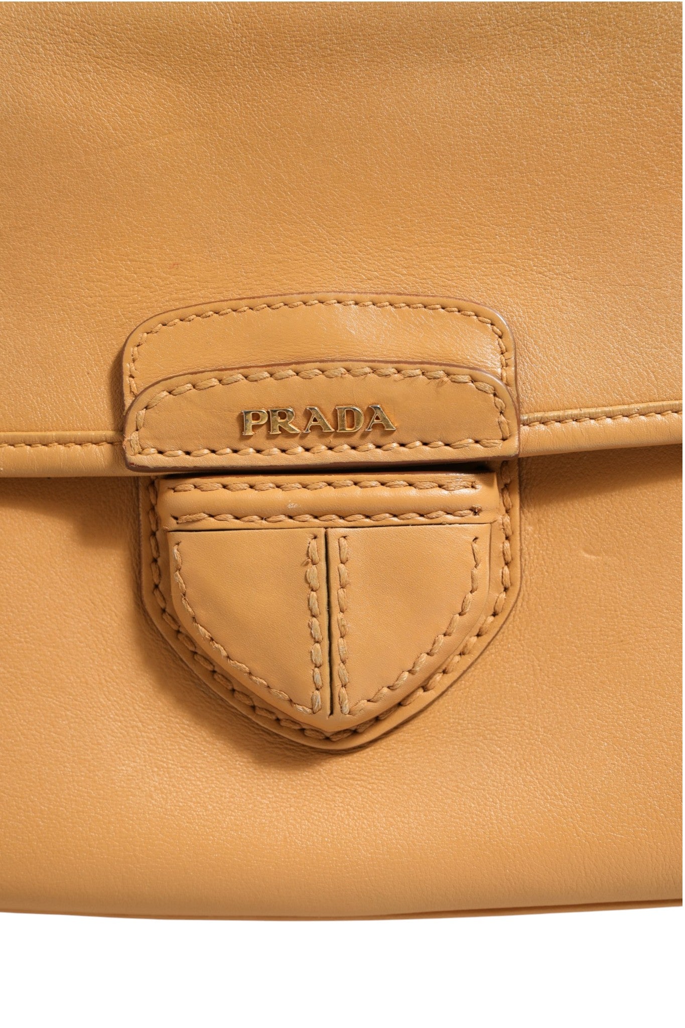 Discover the Prada Sidonie Beige Pebble Leather Shoulder Bag, a testament to exquisite craftsmanship and timeless elegance, perfect for elevating your style narrative.