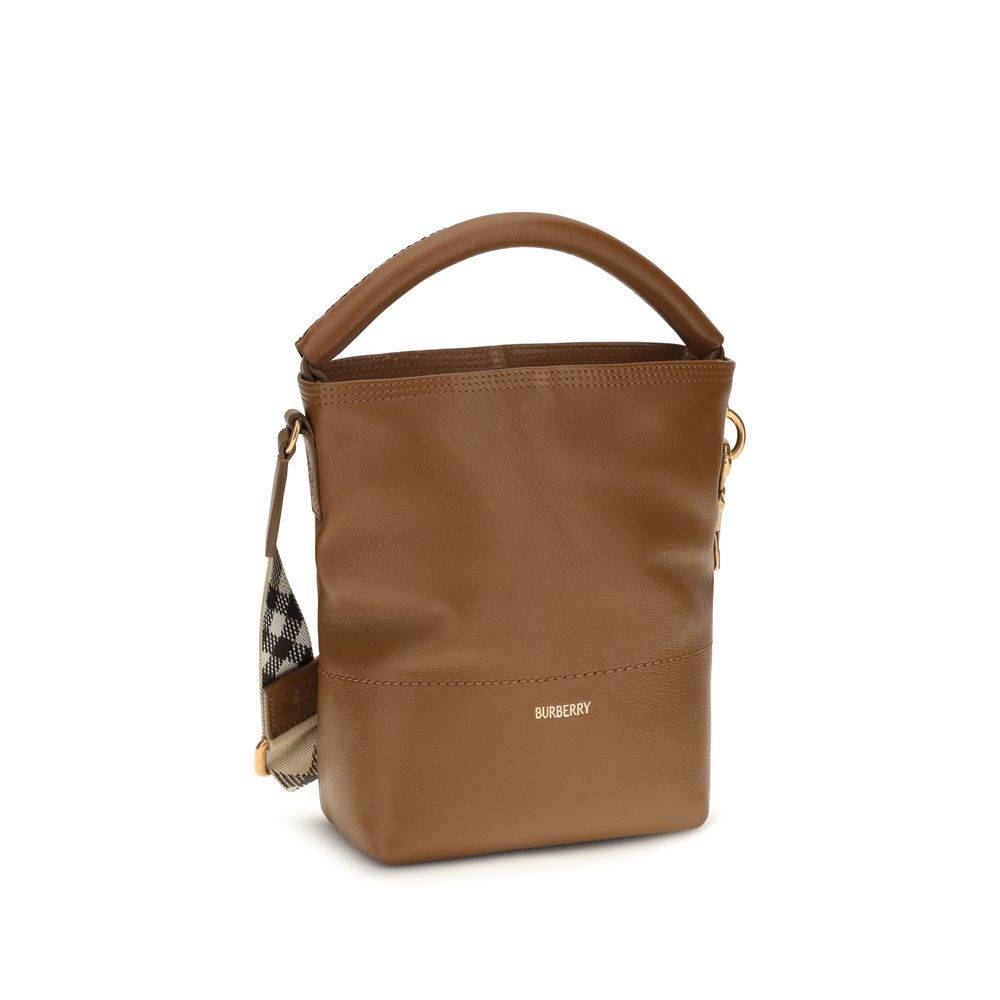 Elevate your style with the Burberry Brown Calf Leather Bos Taurus Bucket Bag, a fusion of exquisite craftsmanship and timeless elegance, perfect for any discerning connoisseur.