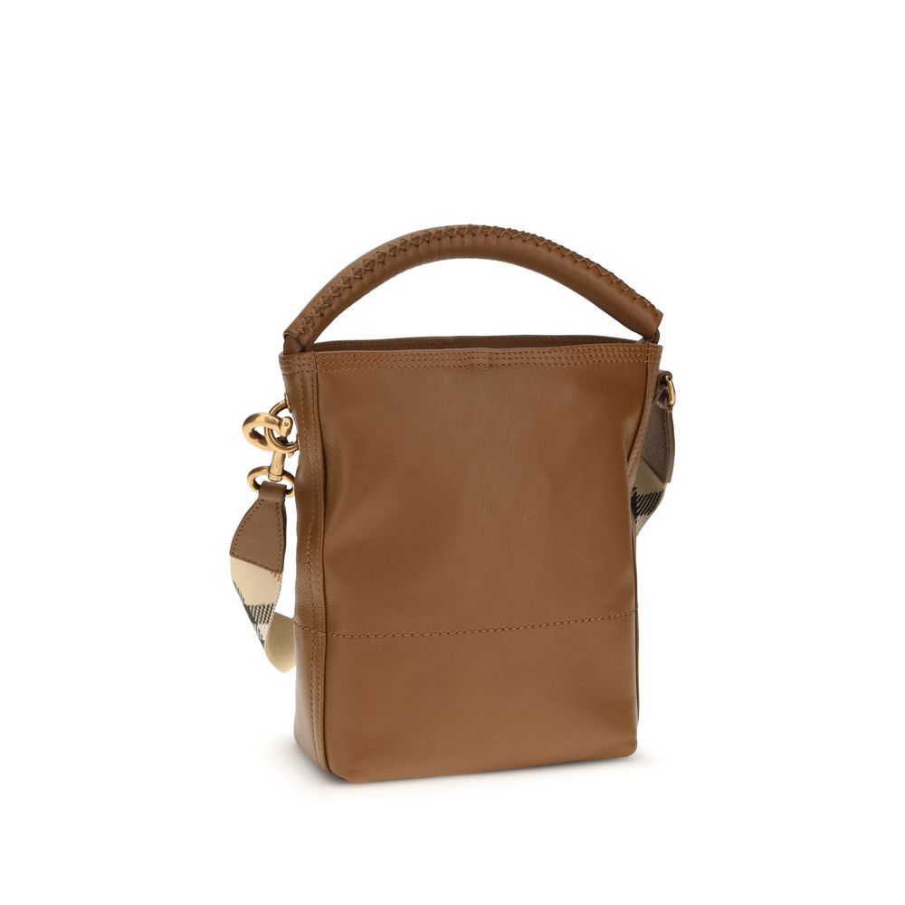 Elevate your style with the Burberry Brown Calf Leather Bos Taurus Bucket Bag, a masterpiece of craftsmanship that embodies contemporary elegance and timeless luxury.