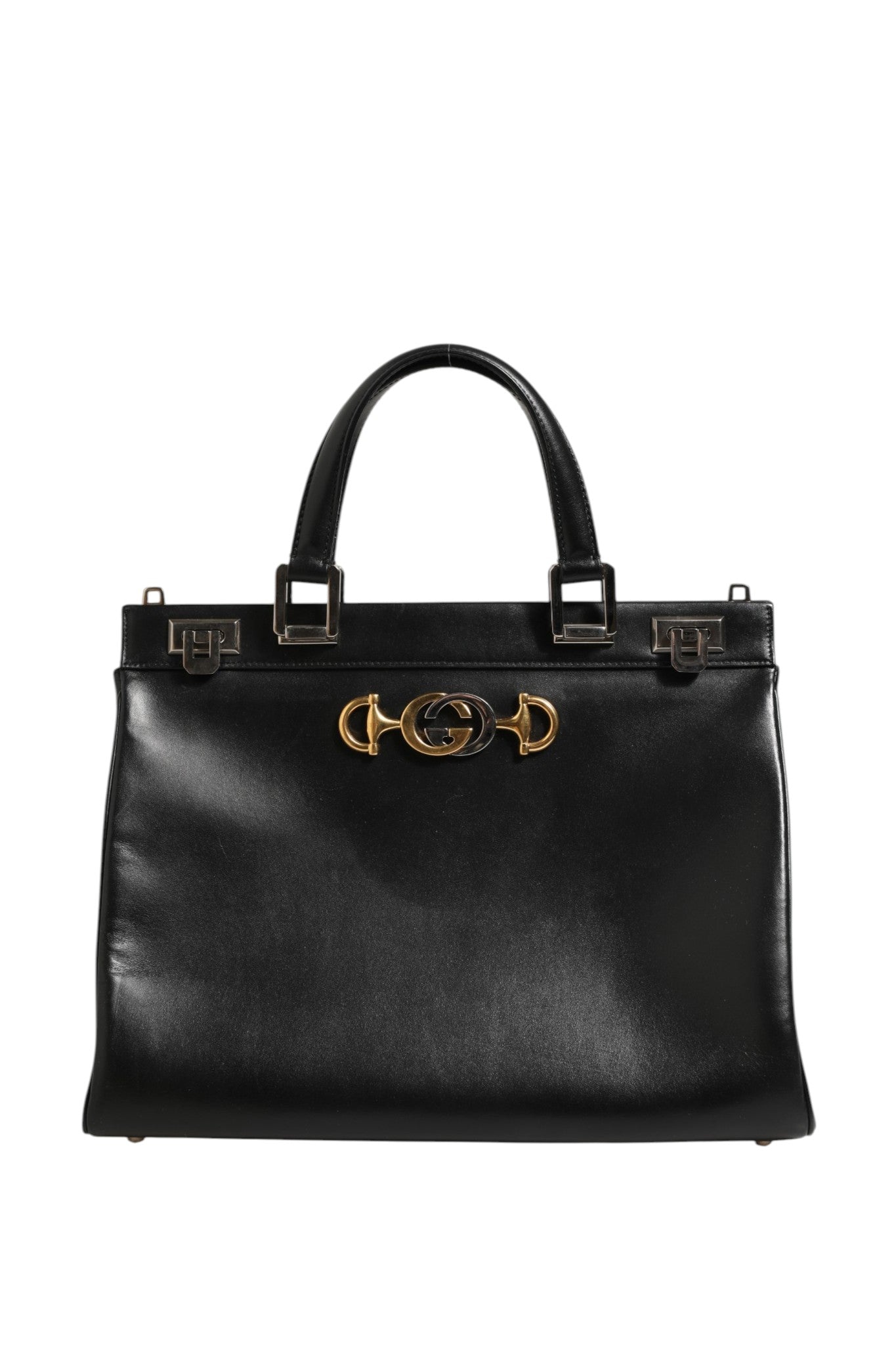 Discover the Gucci Zumi Medium Top Handle Bag, a timeless blend of elegance and practicality, crafted for those who embrace luxury and individuality.