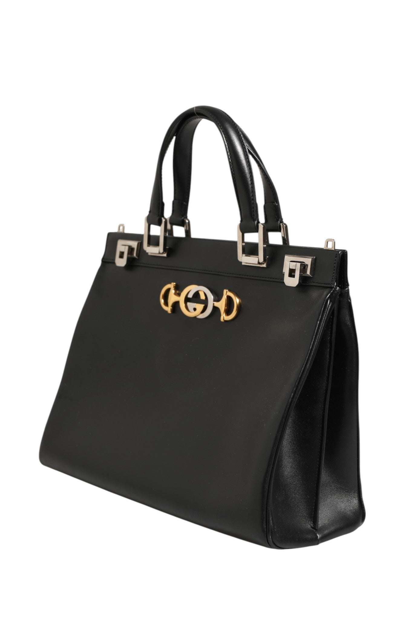 Elevate your style with the Gucci Zumi Medium Top Handle Bag, a timeless symbol of luxury and sophistication, perfect for the discerning fashion connoisseur.