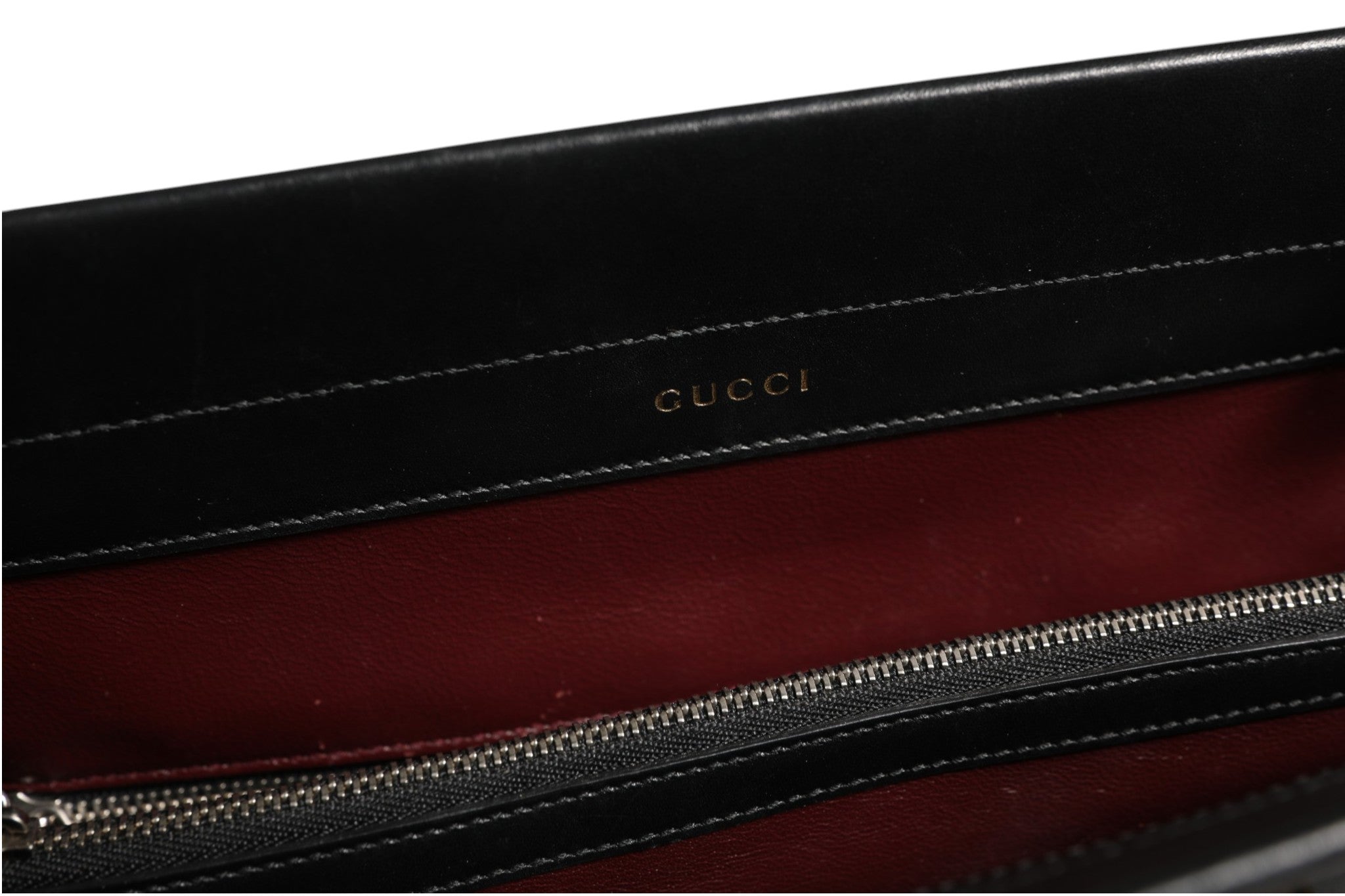 Discover the Gucci Zumi Medium Top Handle Bag, a timeless blend of elegance and functionality, crafted for those who appreciate luxury and sophistication.