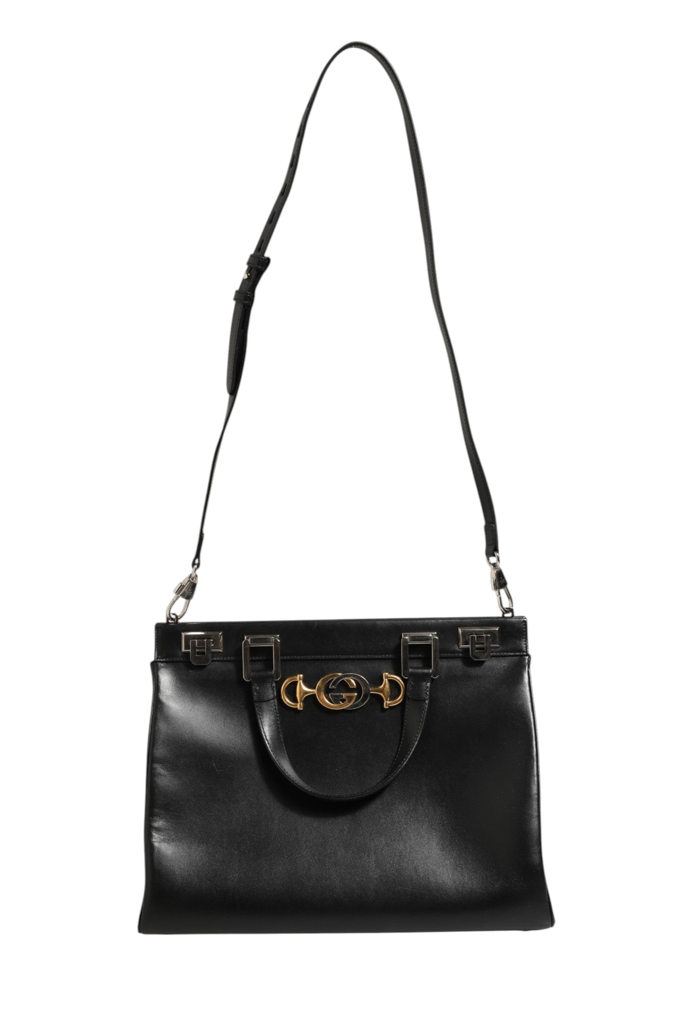 Discover the Gucci Zumi Medium Top Handle Bag, a timeless blend of elegance and functionality, embodying luxury craftsmanship for the discerning individual.