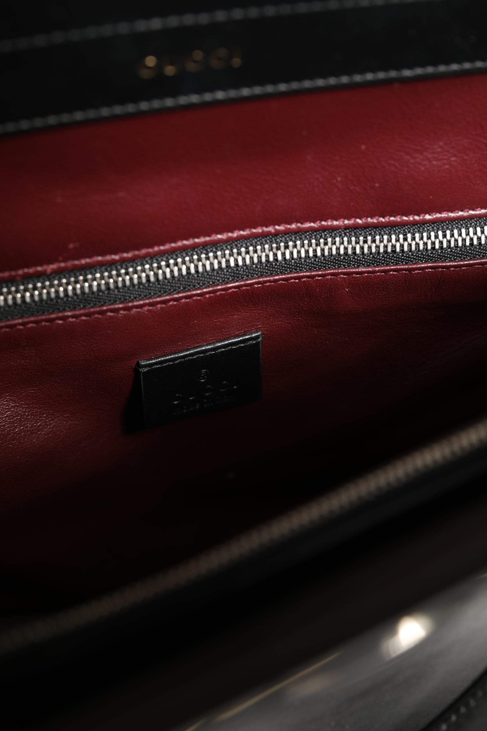 Experience the allure of the Gucci Zumi Medium Top Handle Bag, a timeless blend of elegance and sophistication, perfect for those who embrace luxury and individuality.