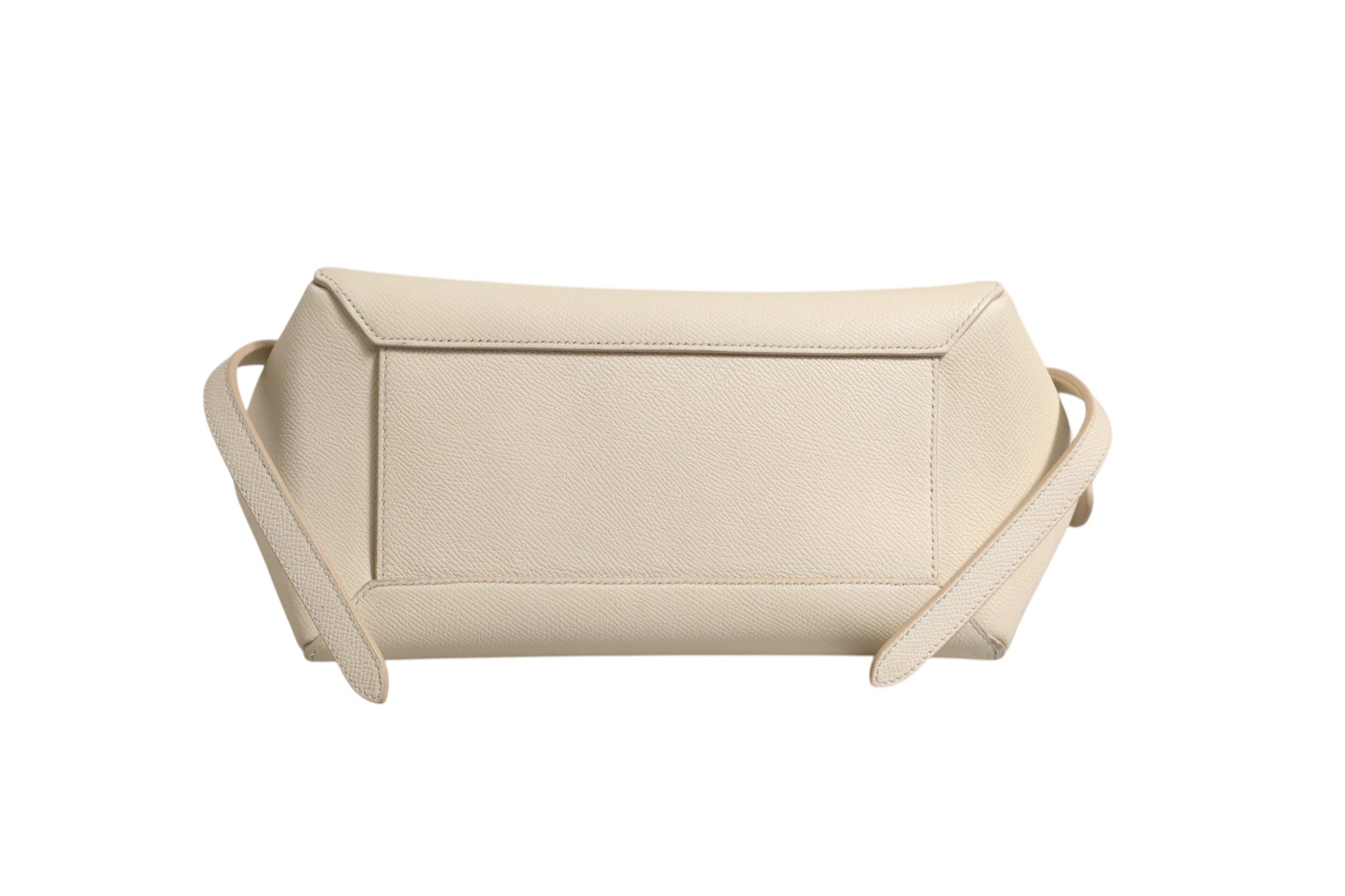Experience the allure of the Celine Nano Belt Bag in Off White grained calfskin, a masterpiece of craftsmanship that elevates your style with timeless elegance and sophistication.