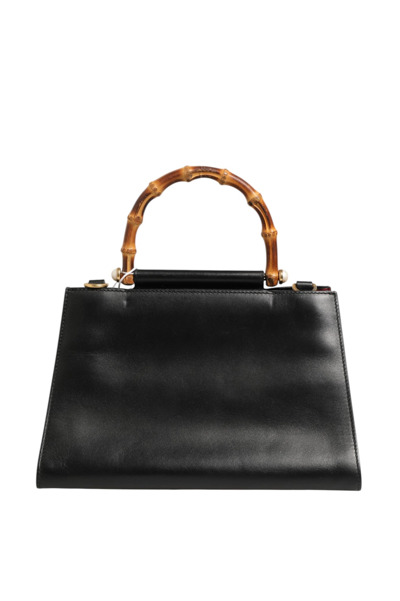 Discover the Gucci Nymphaea Bamboo Top Handle Leather Bag, a masterpiece of craftsmanship in luxurious black leather, perfect for those who embrace elegance and sophistication.
