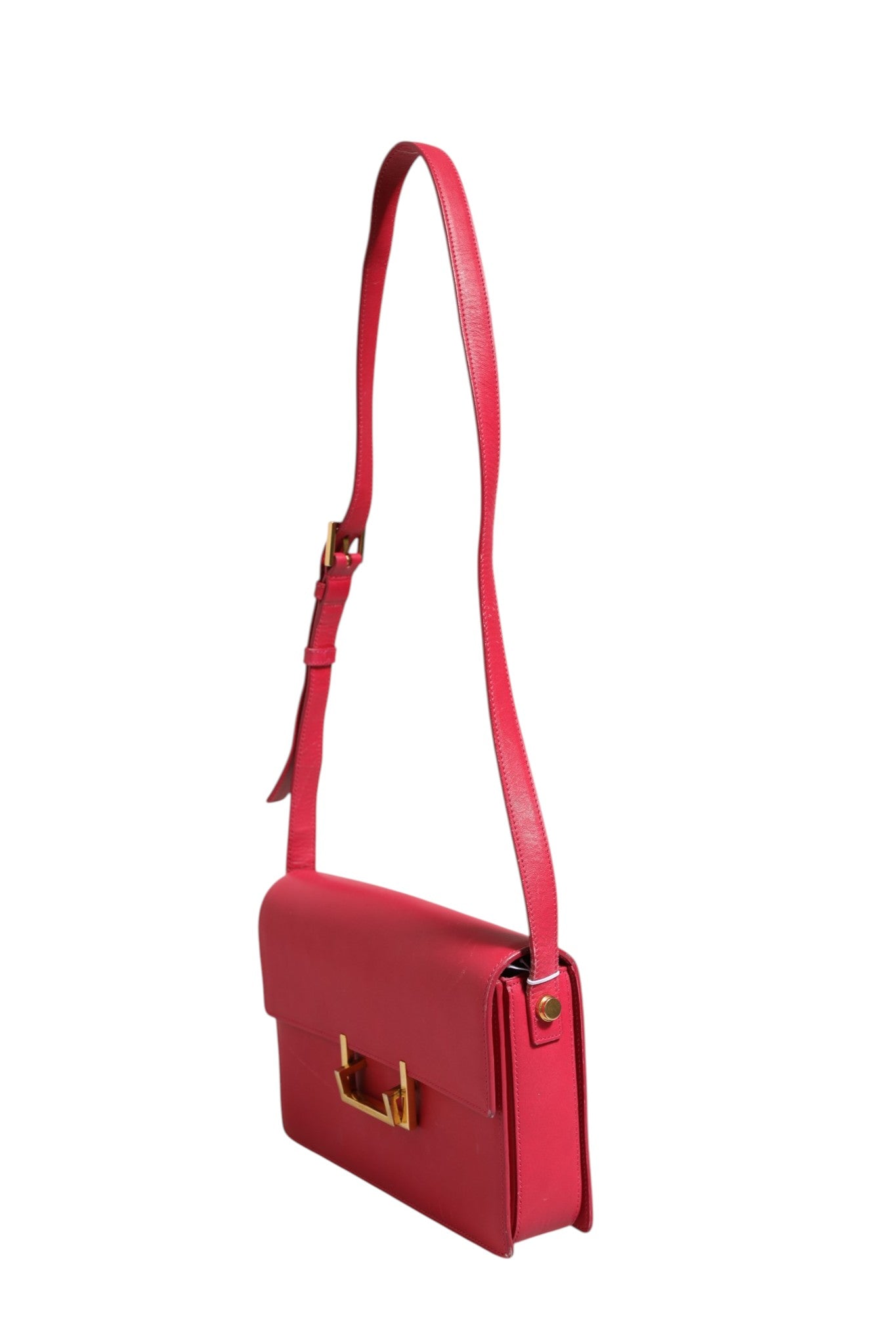 Elevate your style with the Saint Laurent Loulou Handbag, a timeless pink leather masterpiece that embodies luxury and sophistication for the discerning individual.