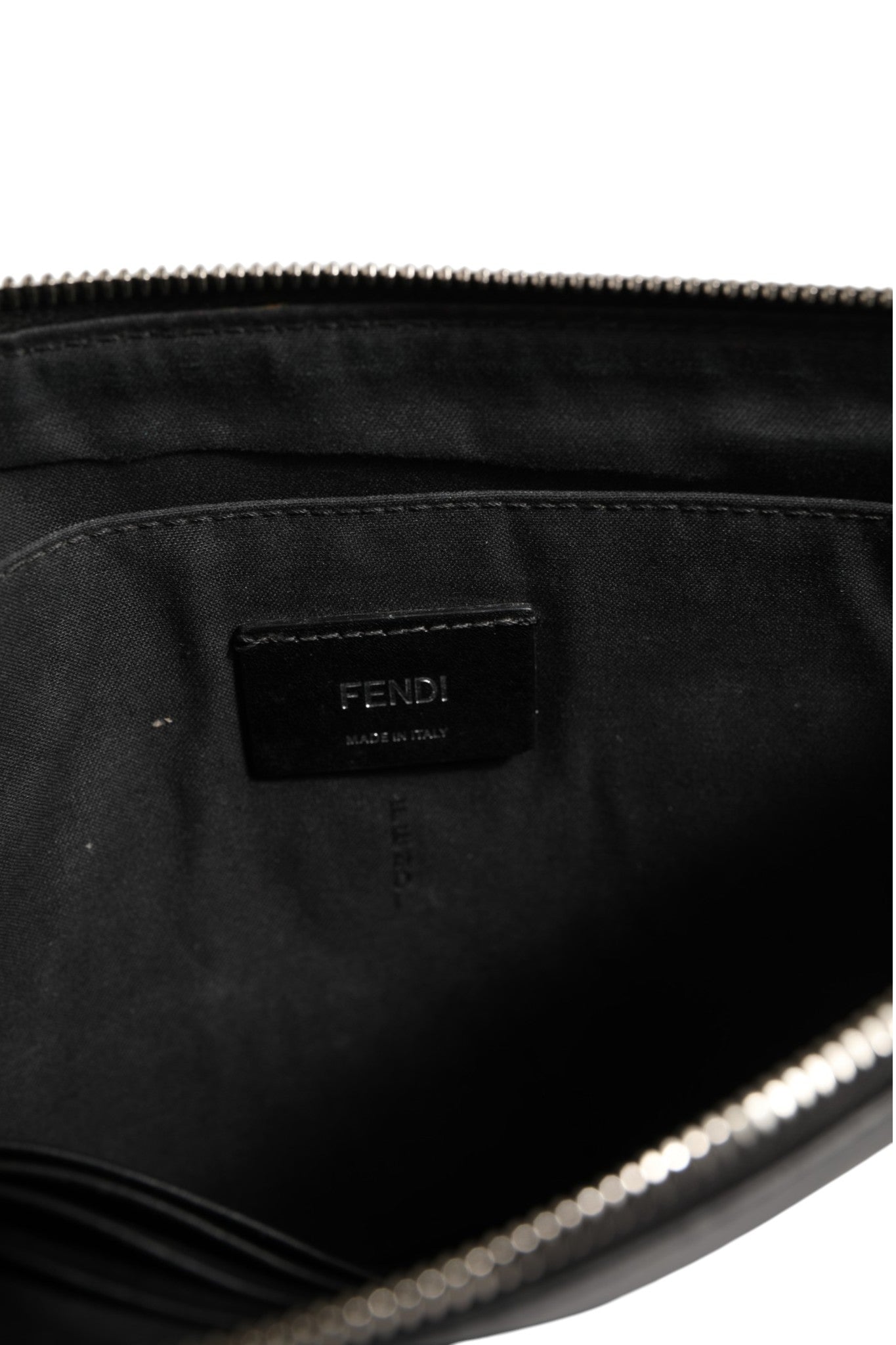 Discover the Fendi Monster Eyes Clutch Bag, where exquisite craftsmanship meets iconic design, perfect for those who embody sophistication and allure.