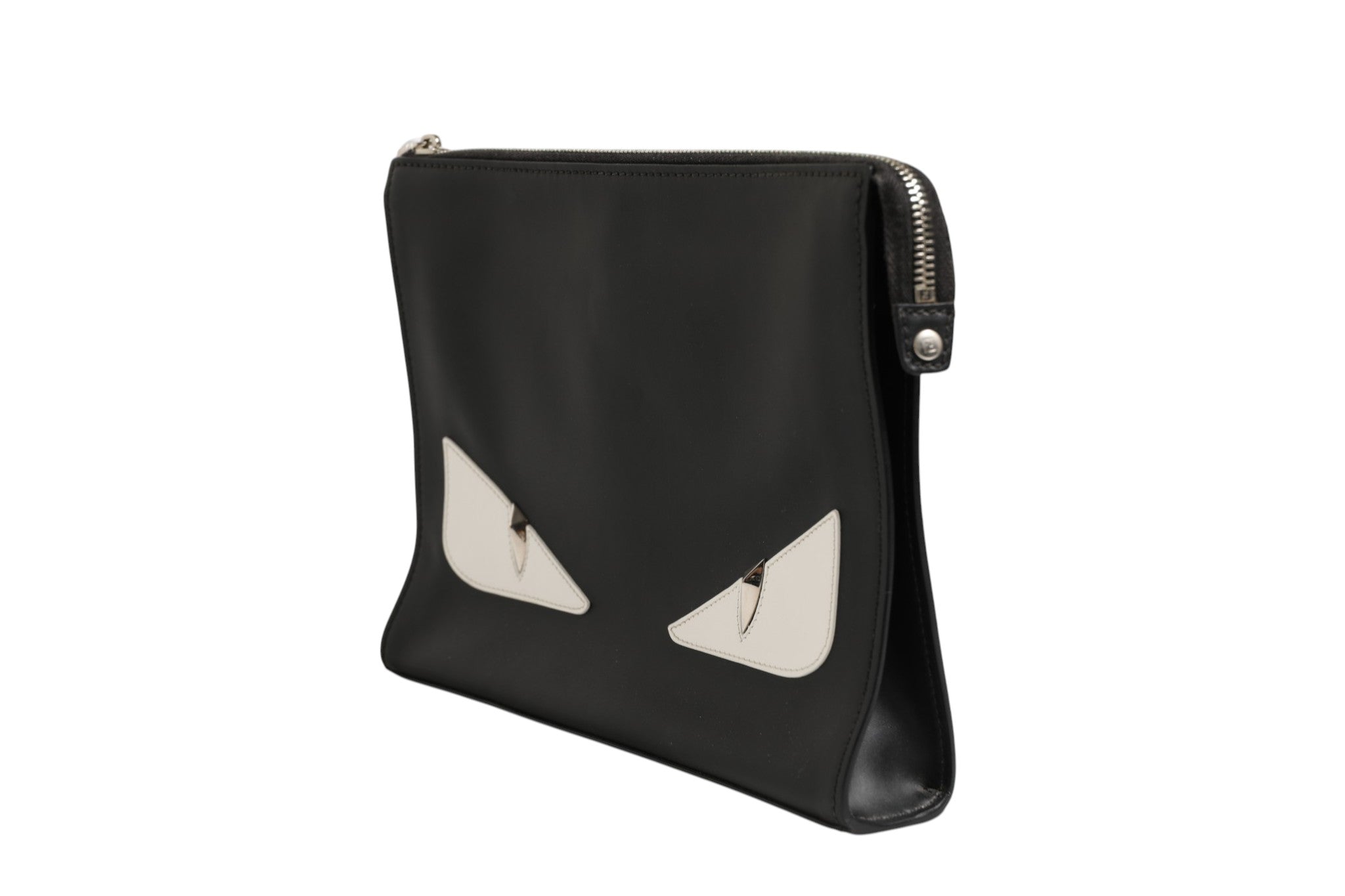 Indulge in the Fendi Monster Eyes Clutch Bag, where exquisite craftsmanship meets iconic design, elevating your style with timeless elegance and bold allure.