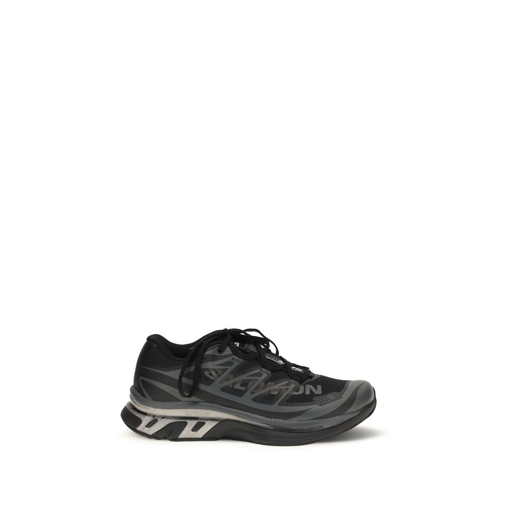 Indulge in the MM6 Black Polyamide Athletic Sneakers, where exquisite craftsmanship meets urban sophistication, offering unparalleled comfort and style for the discerning individual.