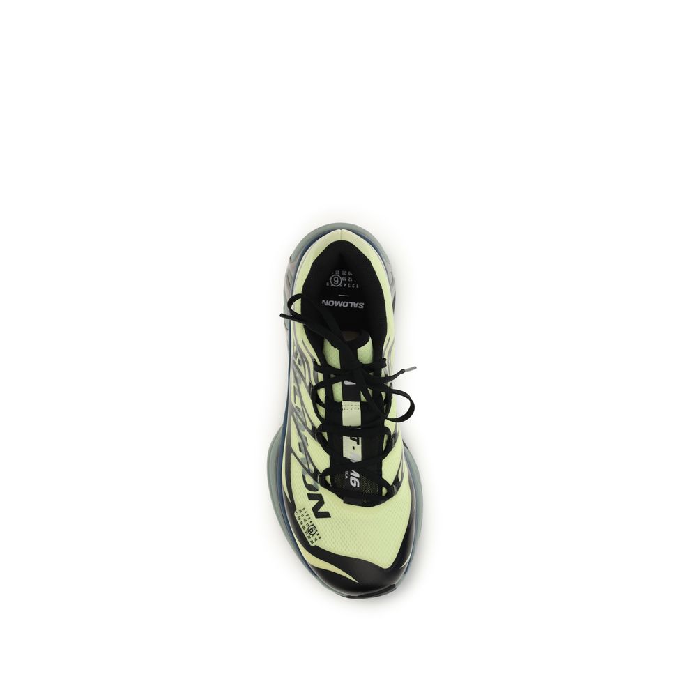 Discover the MM6 Black Polyamide Athletic Sneakers, where artisanal craftsmanship meets luxury. Elevate your style with unparalleled versatility and sophisticated design.