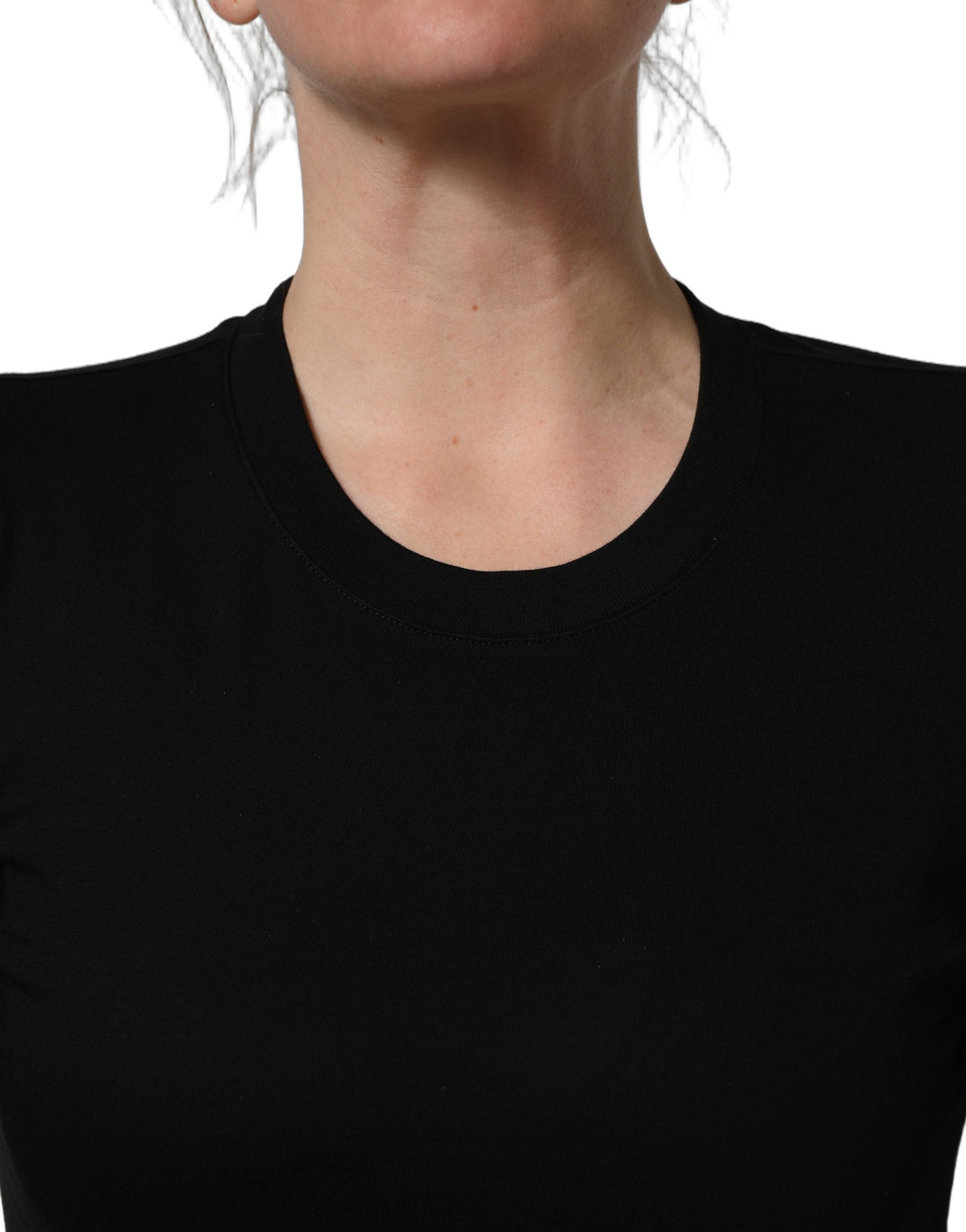 Elevate your wardrobe with the Dolce & Gabbana Black Long Sleeves Crew Neck Pullover Sweater, a masterpiece of Italian craftsmanship in luxurious cotton, embodying timeless elegance and sophistication.