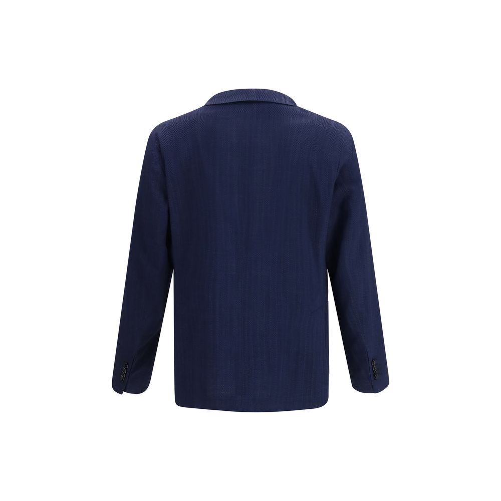 Elevate your wardrobe with the Tagliatore Blue Wool Oves Aries Blazer, a masterpiece of herringbone craftsmanship that exudes timeless luxury and sophistication.