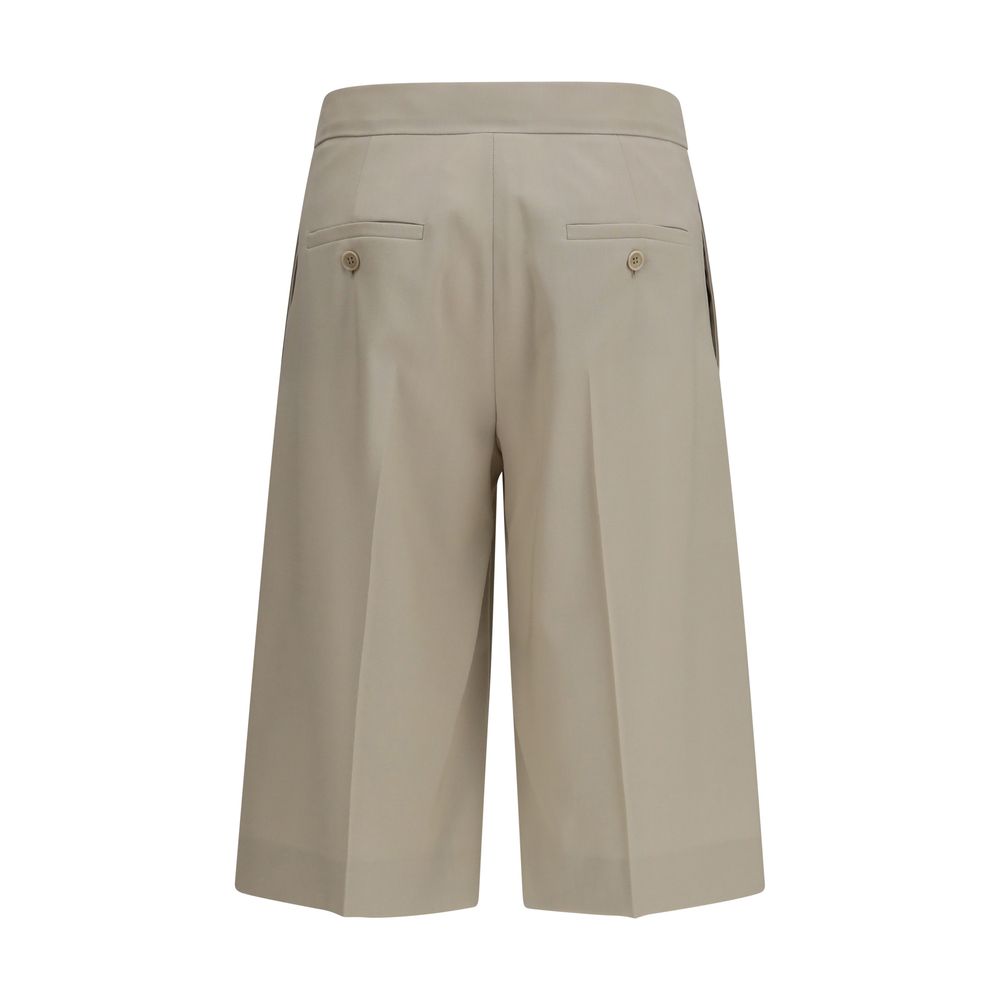 Indulge in the Max Mara Beige Wool Oves Aries Bermuda Shorts from SS26, crafted from a luxurious virgin wool blend for unparalleled elegance and timeless sophistication.