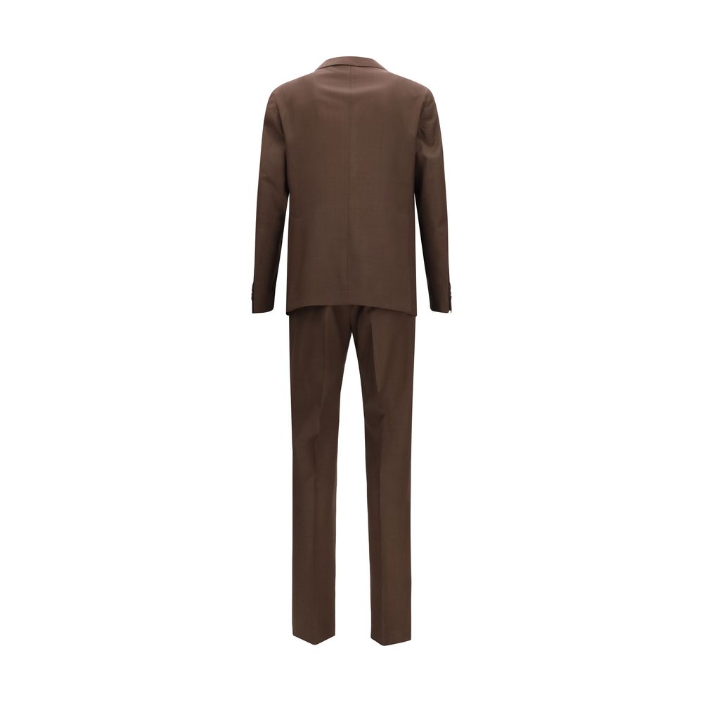 Elevate your wardrobe with the Tagliatore Brown Wool Oves Aries Two-Piece Suit, crafted from 100% fleece wool, embodying timeless elegance and sophistication for discerning individuals.