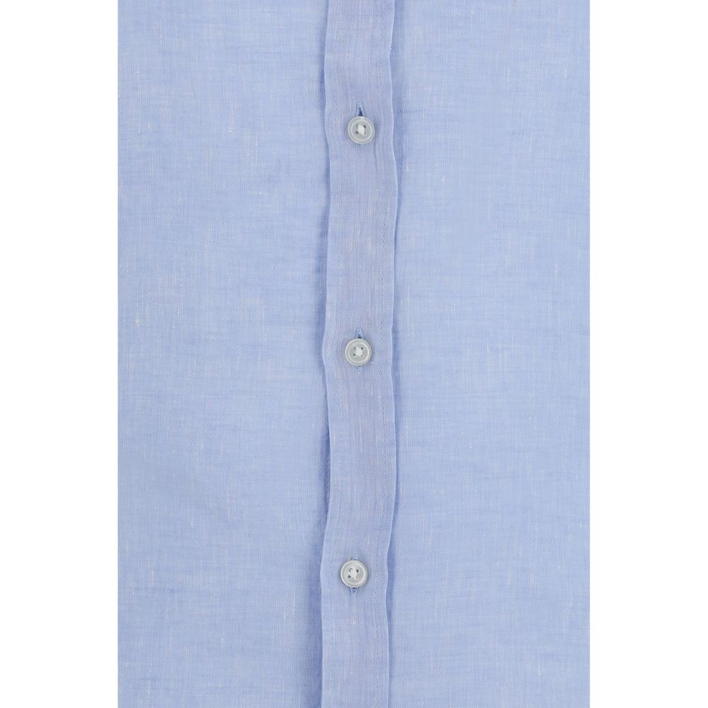 Elevate your style with the Hugo Boss Black Blue Linen Dress Shirt, a luxurious blend of 100% linen, designed for effortless sophistication in every season.