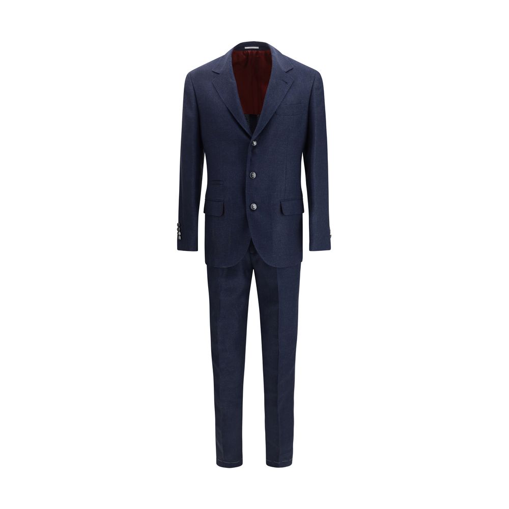 Discover the Brunello Cucinelli Blue Wool Oves Aries Two-Piece Suit, a masterpiece of tailored elegance crafted from luxurious materials, perfect for the discerning individual.