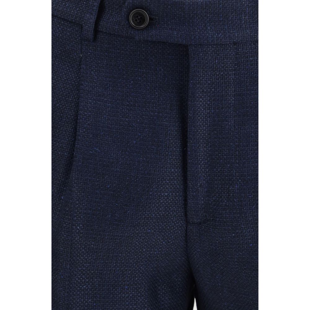 Indulge in the exquisite Brunello Cucinelli Blue Wool Oves Aries Two-Piece Suit, crafted from a luxurious blend of Wool Ovis Aries, linen, and silk for timeless elegance.