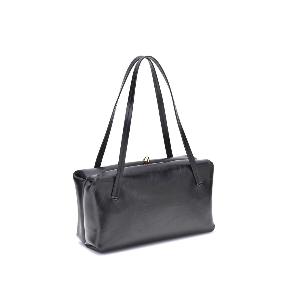 Indulge in the Jil Sander Black Calf Leather Bos Taurus Shoulder Bag, a masterpiece of exquisite craftsmanship and timeless elegance, perfect for the discerning individual.