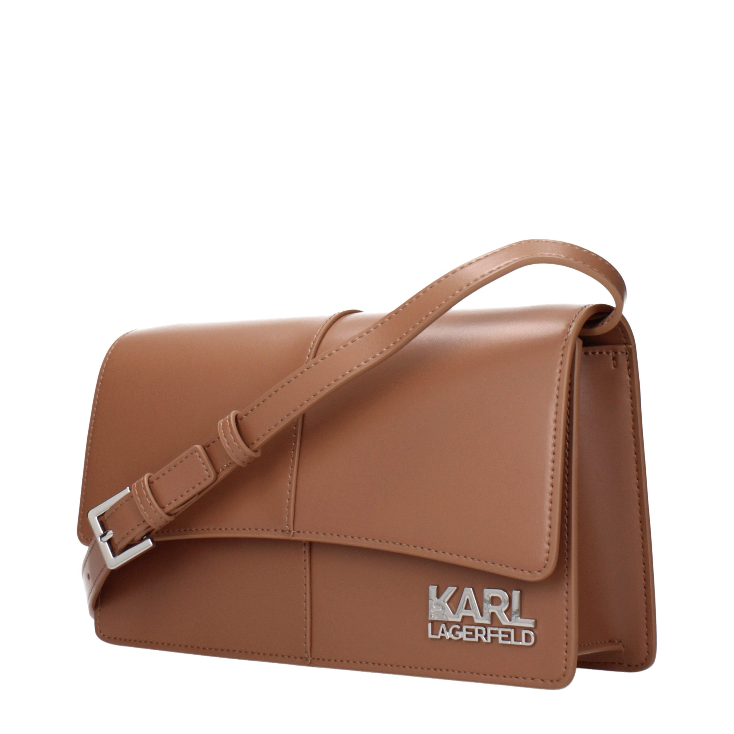 Indulge in the exquisite allure of the Karl Lagerfeld Brown Polyethylene Crossbody Bag, a timeless accessory that embodies sophistication and luxurious craftsmanship for every occasion.