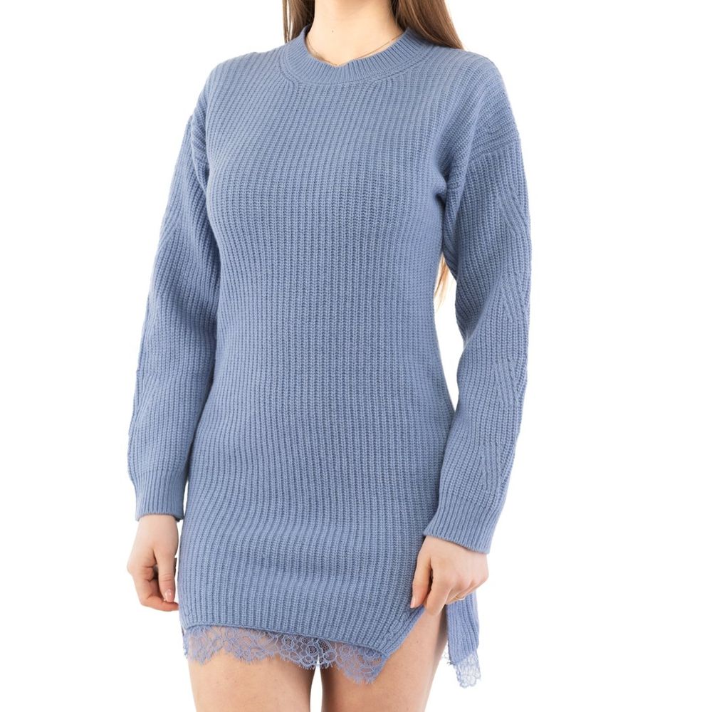 Indulge in the exquisite Moschino Purple Wool Casual Dress, a masterpiece of luxurious craftsmanship in soft lilac, perfect for elevating your style with refined elegance.
