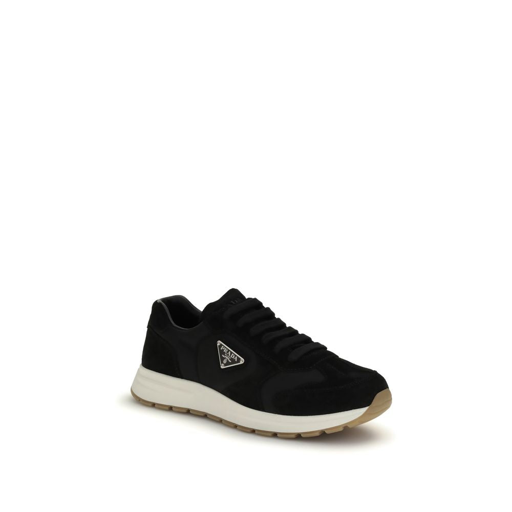 Elevate your style with Prada's Black Recycled Polyamide Athletic Sneakers, a blend of innovative craftsmanship and eco-conscious luxury, perfect for the modern connoisseur.