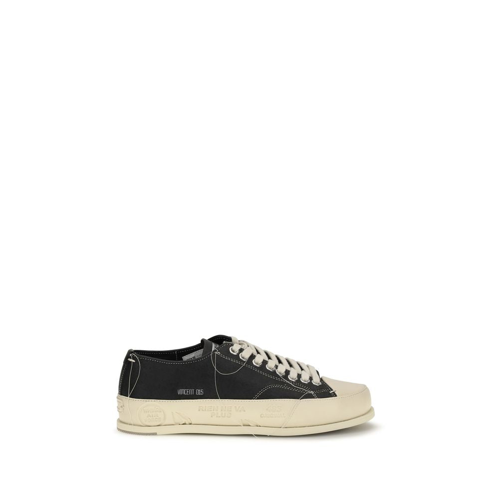 Elevate your style with the Premiata Black Calf Leather Bos Taurus Low Top Sneakers, where exquisite craftsmanship meets modern luxury for the discerning individual.
