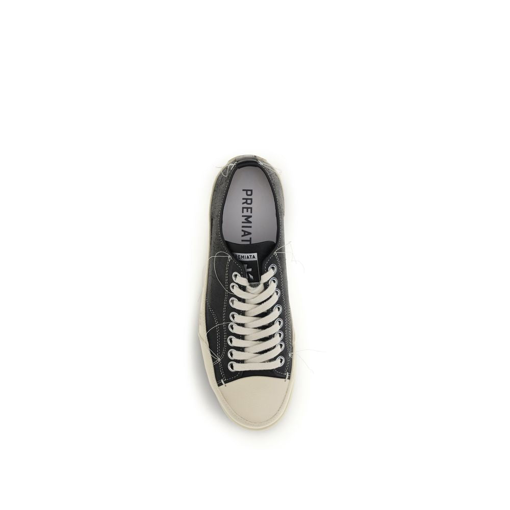 Experience the exquisite craftsmanship of Premiata Black Calf Leather Bos Taurus Low Top Sneakers, where luxury meets contemporary design for the discerning individual.