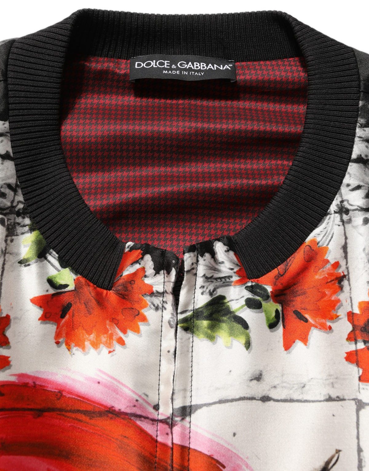 Indulge in the exquisite Dolce & Gabbana Multicolor Majolica Bull Print Bomber Jacket, a silk masterpiece that embodies Italian craftsmanship and luxurious allure.