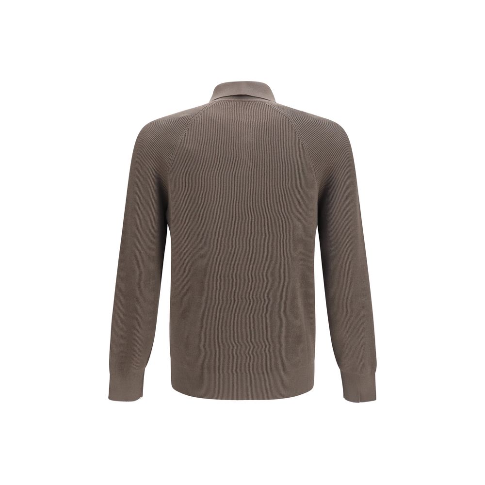 Discover the Brunello Cucinelli Brown Cotton Shirt, a masterpiece of soft knitwear that embodies timeless elegance and luxurious comfort for the discerning individual.