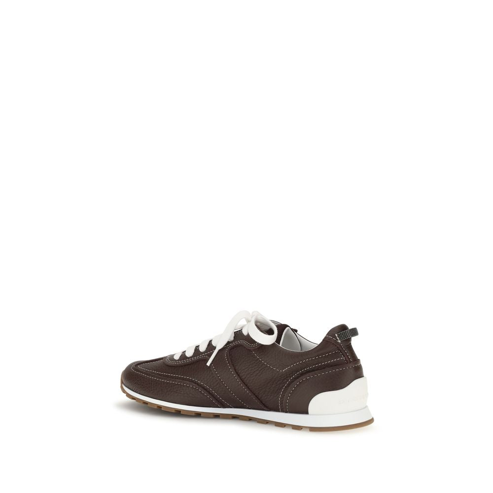 Discover the Brunello Cucinelli Brown Calf Leather Bos Taurus Athletic Sneakers, where exquisite Italian craftsmanship meets refined elegance, perfect for the discerning individual.