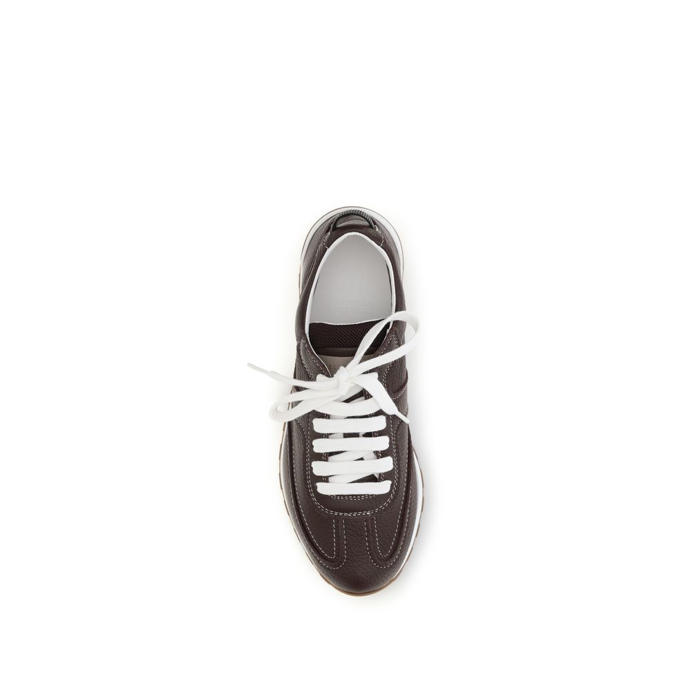 Discover the Brunello Cucinelli Brown Calf Leather Bos Taurus Athletic Sneakers, where exquisite Italian craftsmanship meets refined elegance for the discerning individual.