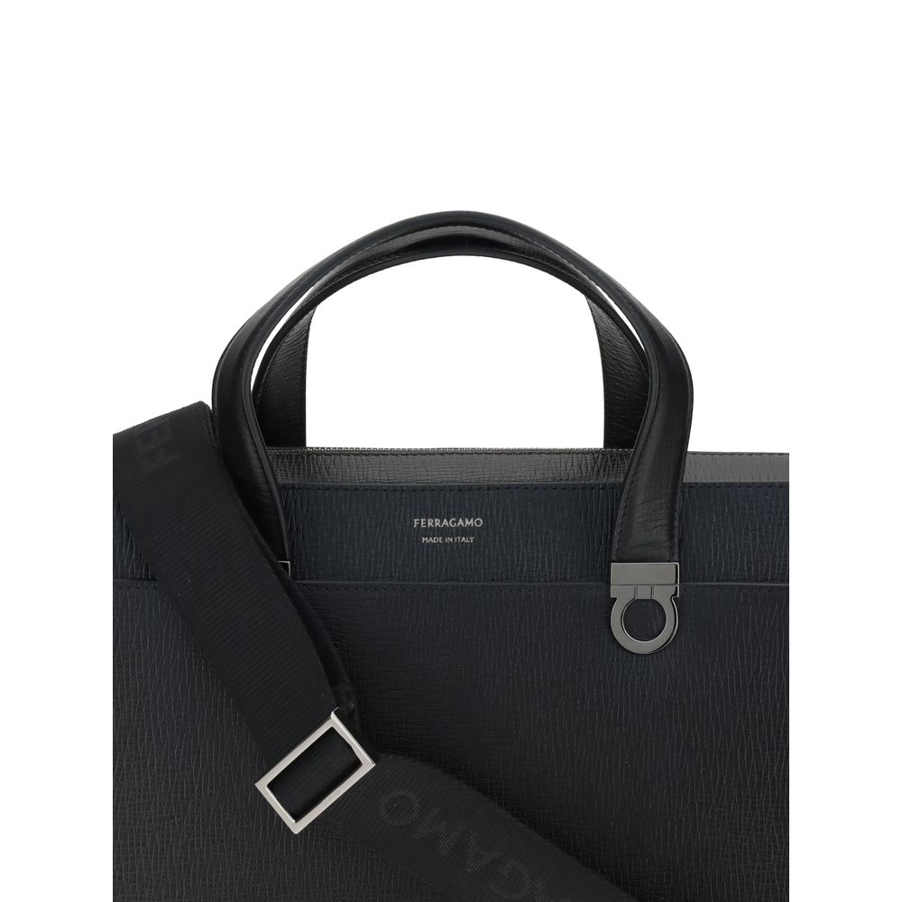 Elevate your professional style with the Ferragamo Black Calf Leather Bos Taurus Briefcase, a masterpiece of craftsmanship and luxury, designed for the discerning individual.