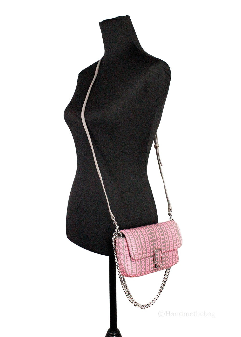 Elevate your style with the Marc Jacobs Neon Pink J Marc Mini Shoulder Bag, a luxurious blend of high-quality leather and exceptional craftsmanship for the modern connoisseur.