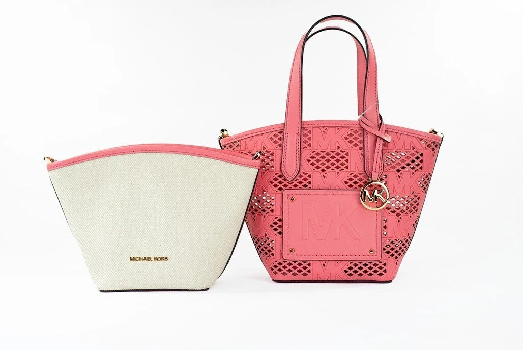 Elevate your style with the Michael Kors Kimber Small Tea Rose Leather 2-in-1 Zip Tote Messenger Bag, a masterpiece of vegan leather that embodies sophistication and versatility.