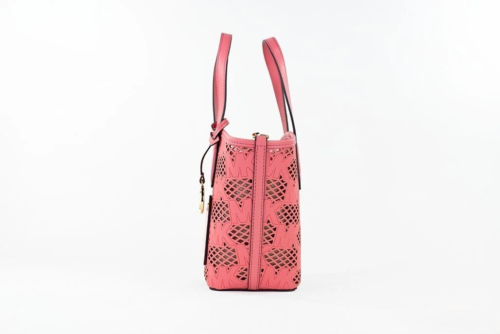 Elevate your style with the Michael Kors Kimber Small Tea Rose Leather 2-in-1 Zip Tote Messenger Bag, a masterpiece of vegan leather that embodies sophistication and versatility.