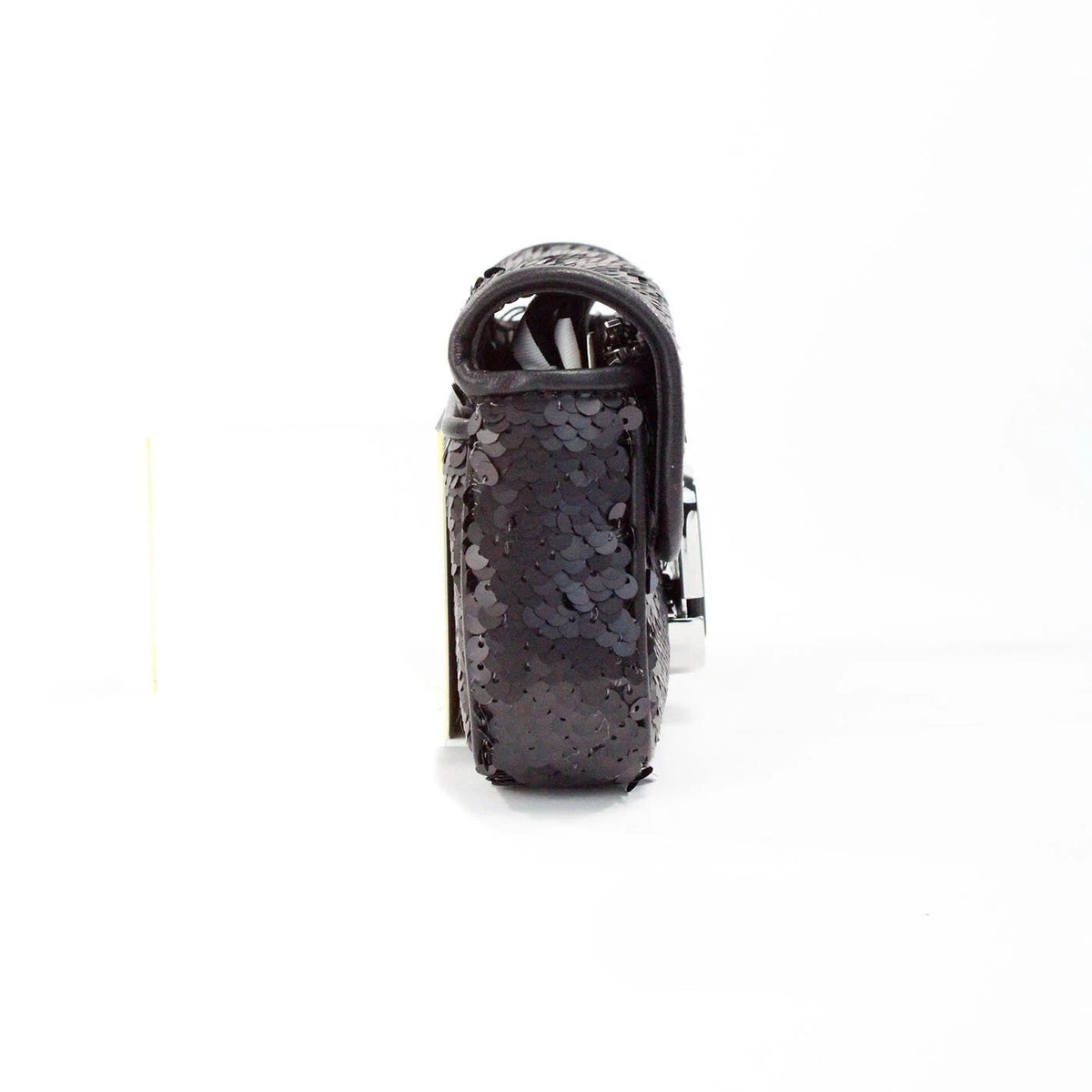 Discover the allure of the Marc Jacobs The Mini J Marc Shoulder Bag, a luxurious sequined leather masterpiece that elevates every occasion with elegance and sophistication.