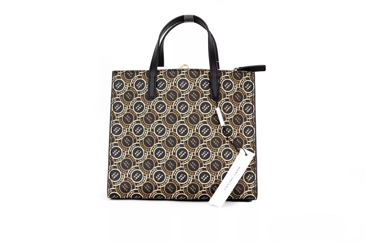 Discover the Marc Jacobs Mini Grind Signet Printed Leather Crossbody Tote, a masterpiece of exquisite craftsmanship in luxurious pebbled leather, perfect for any occasion.