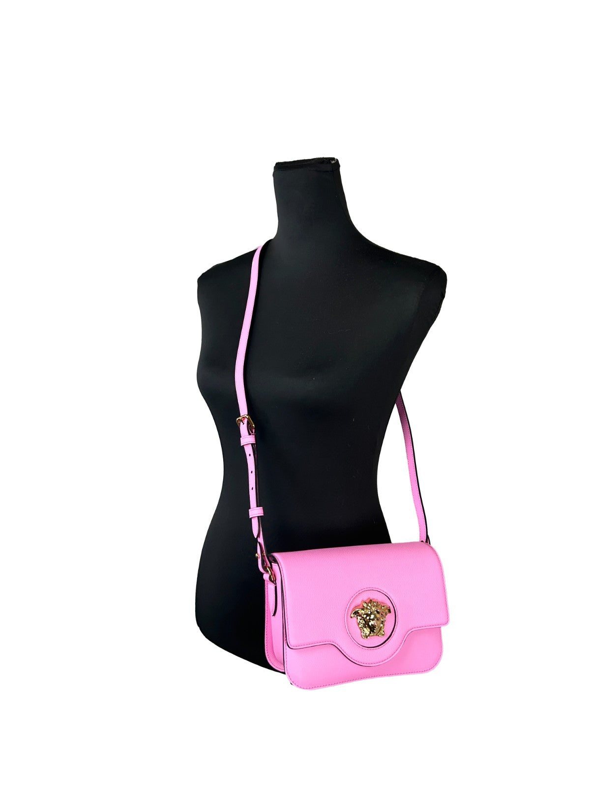 Experience the allure of the Versace La Medusa Pink Leather Shoulder Crossbody Bag, a masterpiece of craftsmanship that embodies luxury and sophistication for every occasion.
