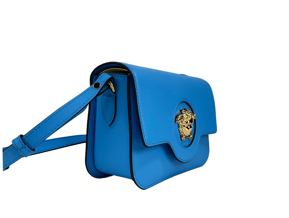 Elevate your style with the Versace La Medusa Blue Leather Shoulder Crossbody Bag, a masterpiece of Italian craftsmanship that embodies luxury and sophistication for every occasion.