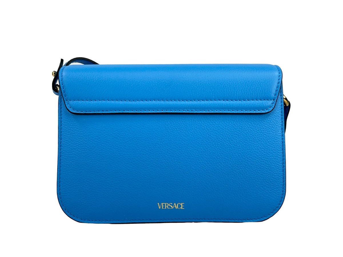 Indulge in the exquisite Versace La Medusa Blue Leather Shoulder Crossbody Bag, a symbol of Italian craftsmanship that elevates your style with luxurious elegance and functionality.