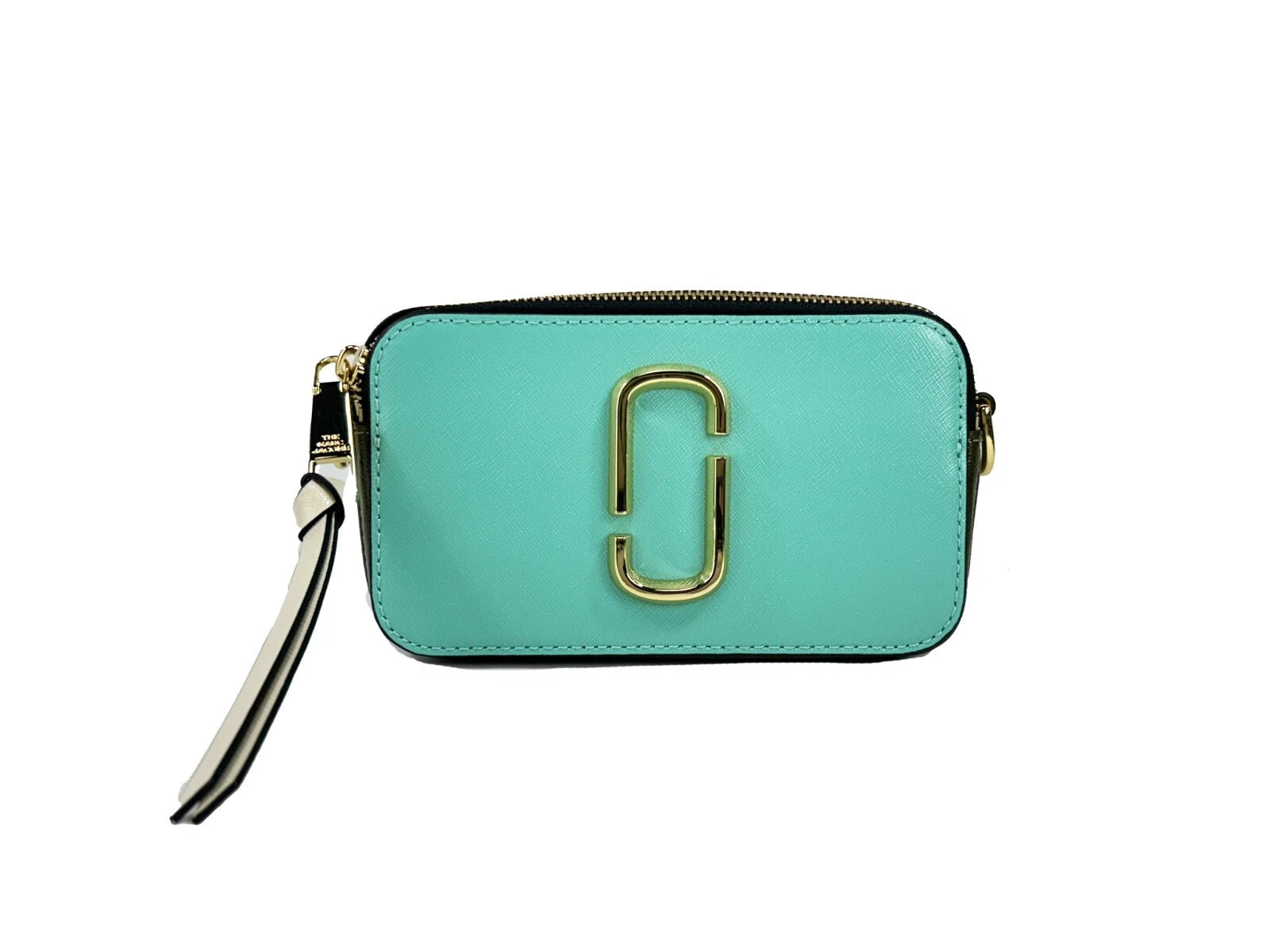 Elevate your style with the Marc Jacobs The Snapshot Crossbody Bag, crafted from luxurious leather, merging sophistication with everyday elegance for the discerning individual.