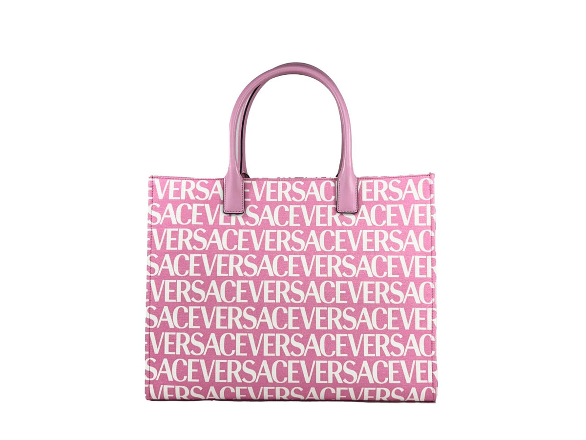 Elevate your style with the Versace Medusa Large Canvas Tote Bag in baby pink, a masterpiece of Italian craftsmanship that embodies luxury and sophistication.